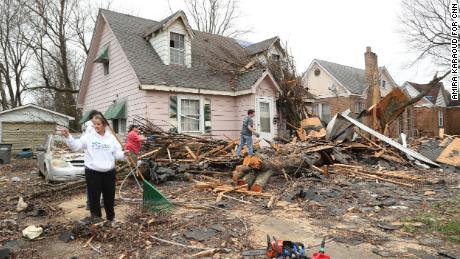 People help clear debris in Mayfield on December 15.