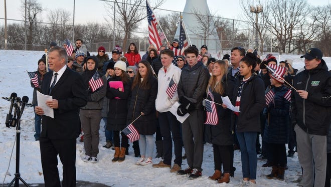 Attorney Erick Kaardal has spearheaded legal challenges to grants Wisconsin cities received from the nonprofit Center for Tech and Civic Life to help them run their elections. He is shown with a group of conservative Edina, Minn., high school students announcing a lawsuit that was later dismissed alleging their school district violated their free speech rights when they spoke out against flag protesters.