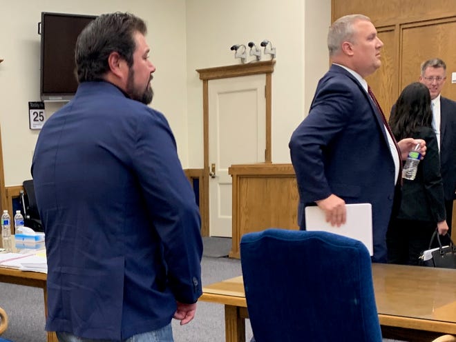 Robert Beadles, left, and his attorney Adam Fulton rise after Judge Egan Walker rejected Beadles' lawsuit over meaningful observation of ballot counting on May 25, 2022 in Washoe County District Court.