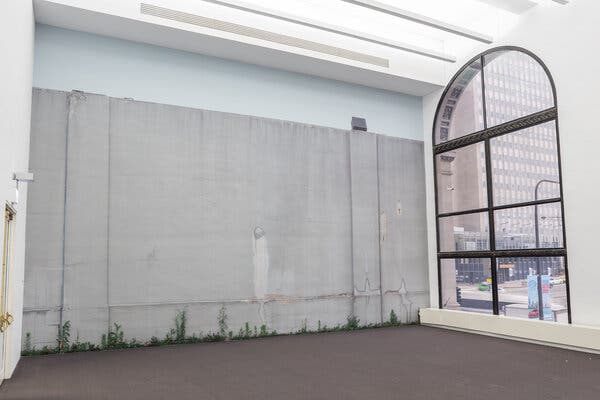 Maria Gaspar’s “Unblinking Eyes, Watching” (2019), a composite photograph printed to scale of the north-end wall of Chicago’s Cook County Jail.
