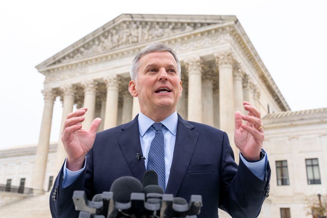 FILE - North Carolina Attorney General Josh Stein speaks in front of the Supreme Court in Washington, on Dec. 7, 2022.