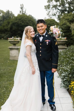 The marriage ceremony of Lindsey Kleyer Choi and Junseong Choi. A micro wedding with 18 guests held at Whitehall, an historic home in Louisville. June 27, 2020. (Photo: Courtesy Tara Lawson, Tara D Photos)