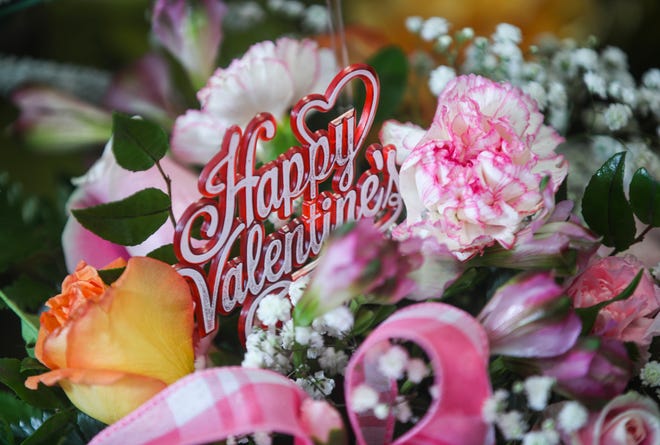 The flowers and floral arrangements at DN Surprise Florist at 2001 West Broadway. The small floral shop offers repeat customer discounts. The flower shop also can be a