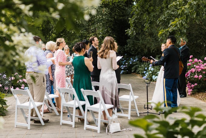 The marriage ceremony of Lindsey Kleyer Choi and Junseong Choi. A micro wedding with 18 guests held at Whitehall, an historic home in Louisville. June 27, 2020 (Photo: Courtesy Tara Lawson, Tara D Photos)