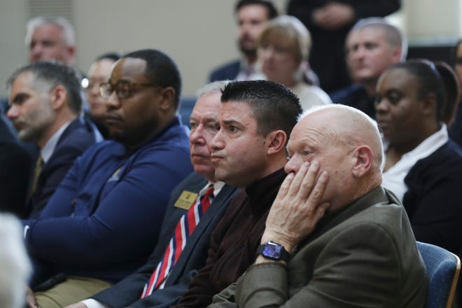 Attendees listened as the Department of Justice announced the findings of a sweeping investigation of the Louisville Metro Police Department at Metro Hall in Louisville, Ky. on Mar. 8, 2023. The report was the result of a nearly two-year probe following the killing of Breonna Taylor.